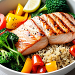 A close-up shot of a vibrantly colorful, perfectly balanced one-bowl meal, showcasing a generous portion of wholesome brown rice or quinoa, topped with artfully arranged lean protein (such as grilled chicken breast or pan-seared salmon) and a colorful medley of fresh vegetables including bright green broccoli, red bell peppers, and leafy spinach. The bowl is set against a clean, minimalist background, emphasizing health, convenience, and deliciousness. Bright natural light, shallow depth of field, high-quality food photography.
